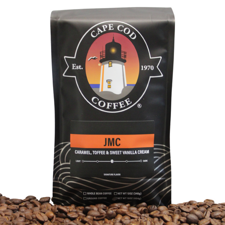 A coffee bag of coffee named JMC that is caramel, toffee, sweet vanilla cream flavored.